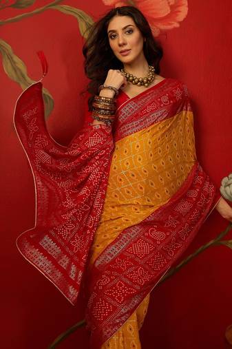 Mustard georgette bandhni printed saree with unstitched blouse piece.