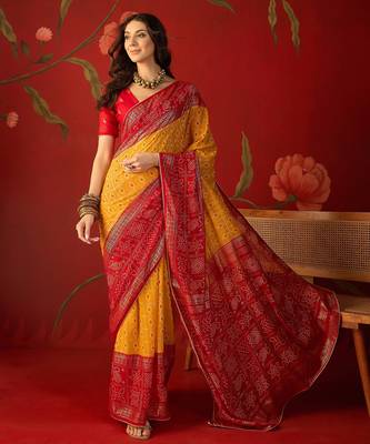 Mustard georgette bandhni printed saree with unstitched blouse piece. 2