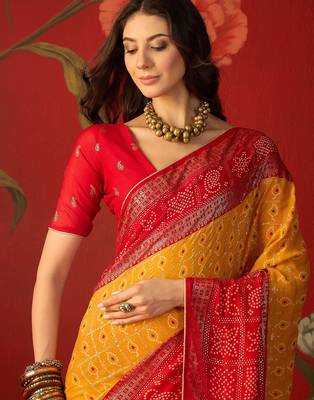 Mustard georgette bandhni printed saree with unstitched blouse piece. 3