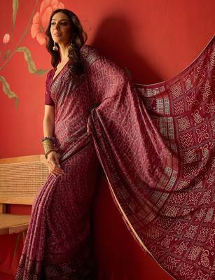 Onion georgette bandhni printed saree with unstitched blouse piece. 1