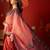Pink georgette bandhni printed saree with unstitched blouse piece.