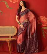 Pink georgette bandhni printed saree with unstitched blouse piece.