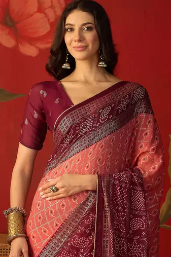 Pink georgette bandhni printed saree with unstitched blouse piece.