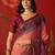 Pink georgette bandhni printed saree with unstitched blouse piece.