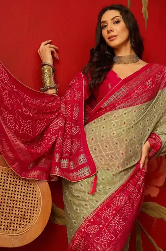 Pista georgette bandhni printed saree with unstitched blouse piece.