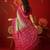 Pista georgette bandhni printed saree with unstitched blouse piece.