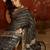 Black silk cotton bandhni saree with unstitched blouse piece.
