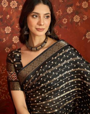 Black silk cotton bandhni saree with unstitched blouse piece. 4