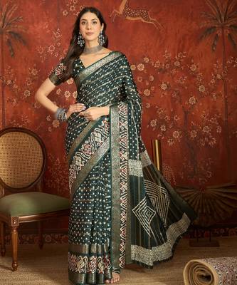 Green silk cotton bandhni saree with unstitched blouse piece. 1