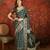 Green silk cotton bandhni saree with unstitched blouse piece.