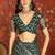 Green silk cotton bandhni saree with unstitched blouse piece.