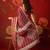 Maroon silk cotton bandhni saree with unstitched blouse piece.