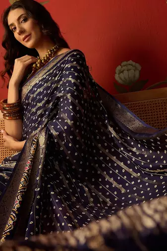 Navy blue silk cotton bandhni saree with unstitched blouse piece.