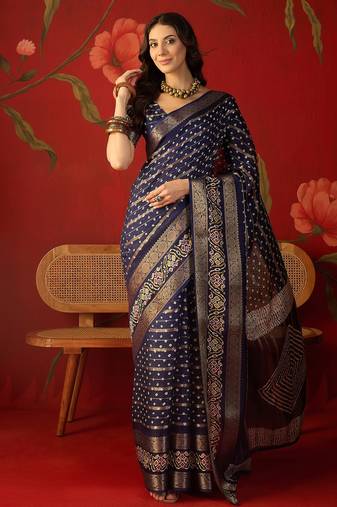 Navy blue silk cotton bandhni saree with unstitched blouse piece.