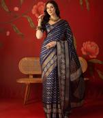 Navy blue silk cotton bandhni saree with unstitched blouse piece.