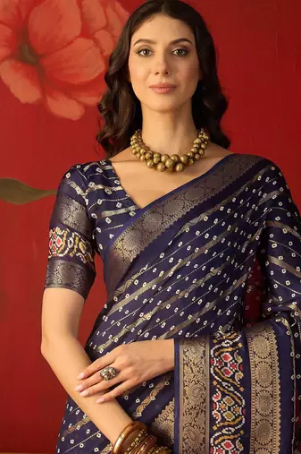 Navy blue silk cotton bandhni saree with unstitched blouse piece.