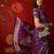 Purple silk cotton bandhni saree with unstitched blouse piece.
