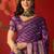 Purple silk cotton bandhni saree with unstitched blouse piece.