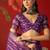 Purple silk cotton bandhni saree with unstitched blouse piece.