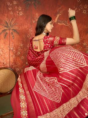Red silk cotton bandhni saree with unstitched blouse piece. 2