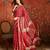 Red silk cotton bandhni saree with unstitched blouse piece.