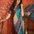 Blue silk cotton bandhni saree with unstitched blouse piece.