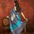 Blue silk cotton bandhni saree with unstitched blouse piece.