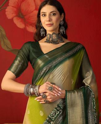Green silk cotton bandhni saree with unstitched blouse piece. 4
