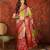 Red silk cotton bandhni saree with unstitched blouse piece.