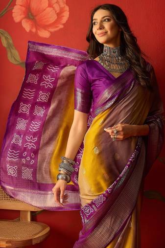 Wine silk cotton bandhni saree with unstitched blouse piece.
