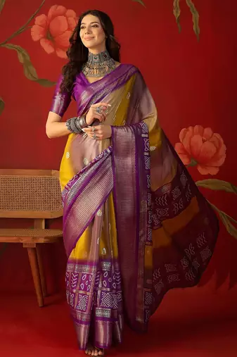 Wine silk cotton bandhni saree with unstitched blouse piece.