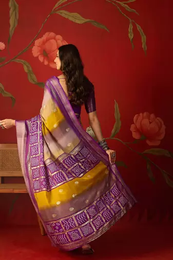 Wine silk cotton bandhni saree with unstitched blouse piece.