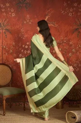 Green chiffon zari checks saree with unstitched blouse piece.