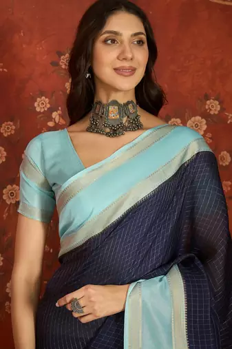 Navy blue chiffon zari checks saree with unstitched blouse piece.