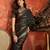 Black silk cotton zari saree with unstitched blouse piece.