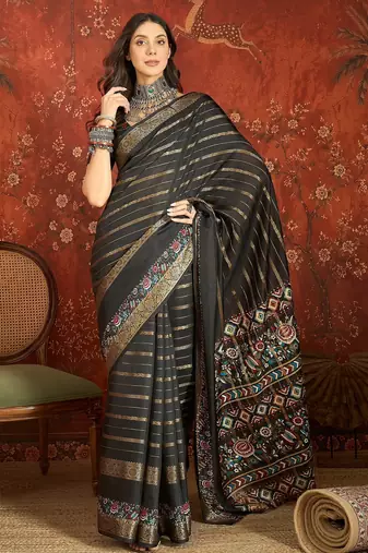 Black silk cotton zari saree with unstitched blouse piece.