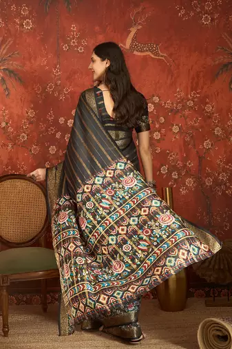 Black silk cotton zari saree with unstitched blouse piece.
