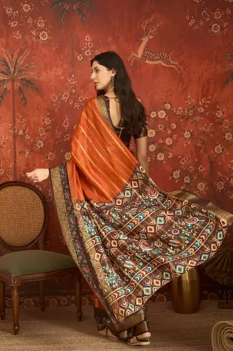 Orange silk cotton zari saree with unstitched blouse piece.