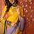 Lilac & yellow silk cotton printed saree with unstitched blouse piece.