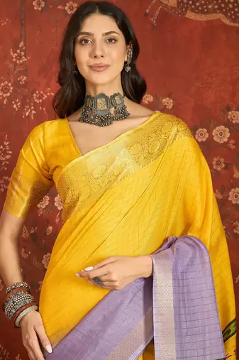 Lilac & yellow silk cotton printed saree with unstitched blouse piece.
