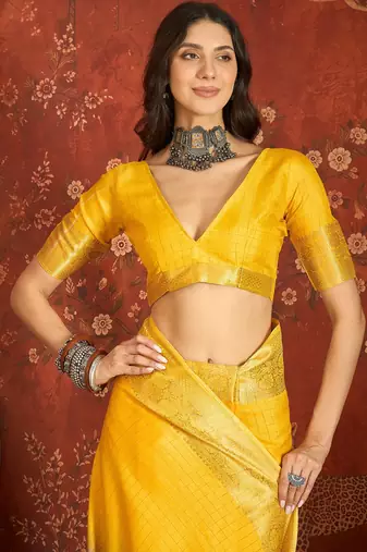 Lilac & yellow silk cotton printed saree with unstitched blouse piece.