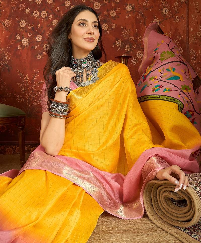 Pink & yellow silk cotton printed saree with unstitched blouse piece.
