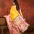 Pink & yellow silk cotton printed saree with unstitched blouse piece.