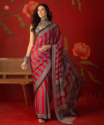 Red satin ajrakh printed saree with unstitched blouse piece. 2