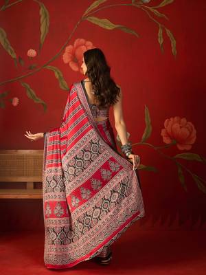 Red satin ajrakh printed saree with unstitched blouse piece. 3