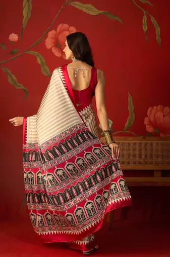 Beige satin printed saree with unstitched blouse piece.