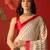 Beige satin printed saree with unstitched blouse piece.