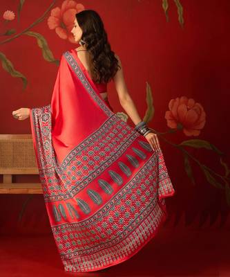 Red satin ajrakh printed saree with unstitched blouse piece. 3