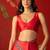 Red satin ajrakh printed saree with unstitched blouse piece.