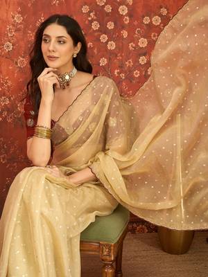 Beige chiffon embroidered saree with unstitched blouse piece. 1